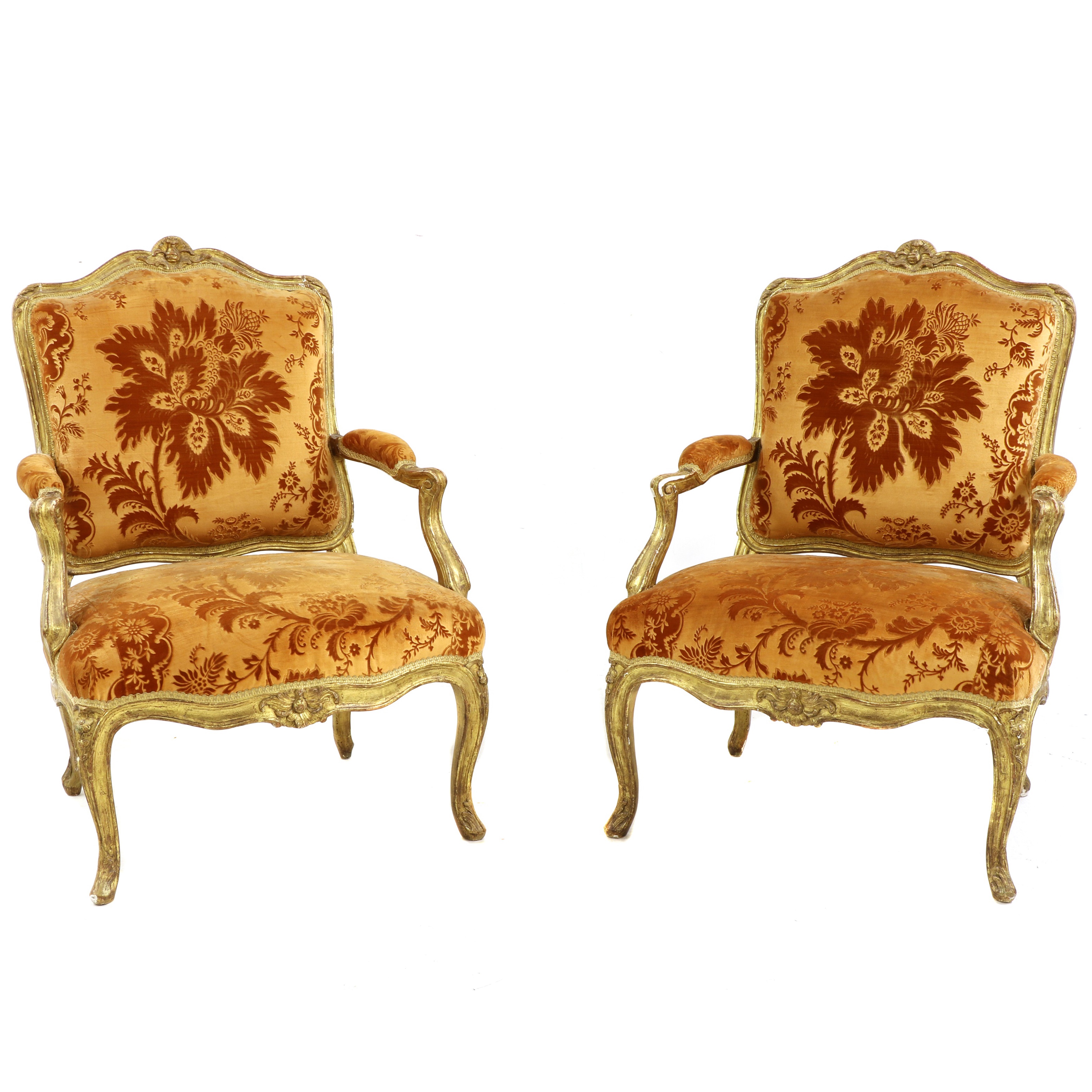 A pair of French Louis XV giltwood fauteuils a la reine attributed to Louis Cresson (1706-1761)